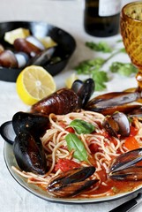 Mussels Marinara Pasta Spaghetti with  tomato sauce. sea food meal. Typical dish of Italian pasta.