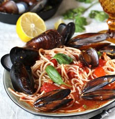 Mussels Marinara Pasta Spaghetti with  tomato sauce. sea food meal. Typical dish of Italian pasta.