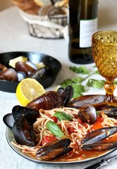 Mussels Marinara Pasta Spaghetti with  tomato sauce. sea food meal. Typical dish of Italian pasta.