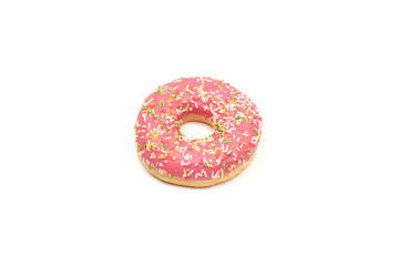 Pink donut with colorful sprinkles isolated on white background.