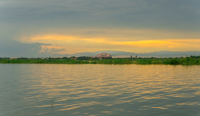 Bueng Boraphet Lake at sunset in Nakhorn Sawan Province, Thailand