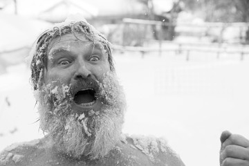 Bearded man, after bathing in the snow - 274172939