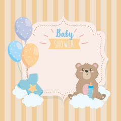 label of teddy bear with feeding bottle and clouds