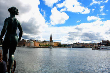 Landscape of the Old Town in Stockholm, Sweden with statue in left corner