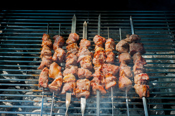 Grilled shashlik in the smoke. Cooking process