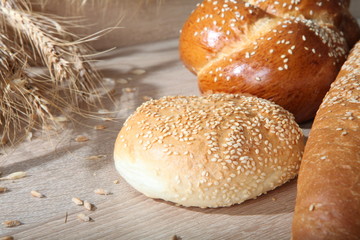 Composition with loaves of bread and rolls