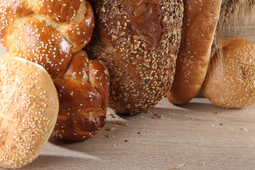 Composition with loaves of bread and rolls