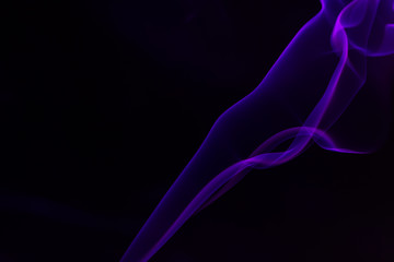 Colorful smoke close-up on a black background