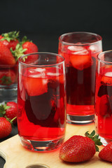 Glasses with strawberry drink with ice	