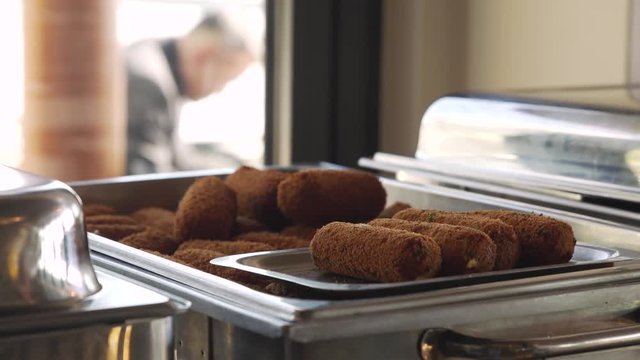Dutch kroketten in a buffet serving tray