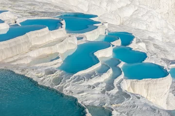 Wall murals White Natural travertine pools and terraces in Pamukkale. Cotton castle in southwestern Turkey