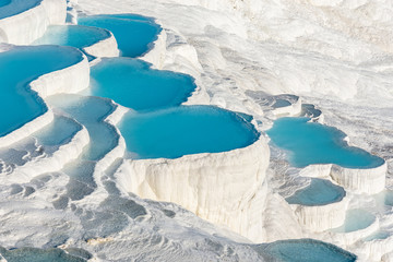 Natural travertine pools and terraces in Pamukkale. Cotton castle in southwestern Turkey