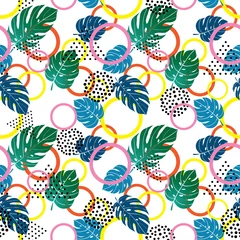 Fototapeten Geometric colorful shapes and tropical leaves seamless pattern © Elinnet