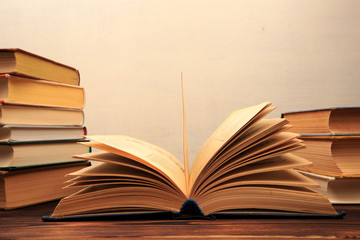 Education learning concept with opening book or textbook in old library, - Image