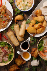 assorted of asian food on wood background