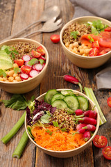 mixed vegetarian  salad with cucumber, carrot, cabbage and chickpea