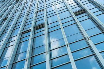 Clouds Reflected in Windows of Modern Office Building.