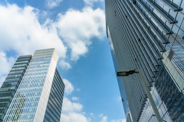 Fototapeta na wymiar Modern office building on a clear sky background.