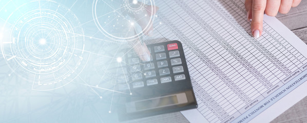 Hands of an accountant working on financial documents; multiple exposure