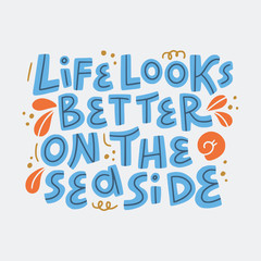 Life looks better on the seaside hand drawn phrase.