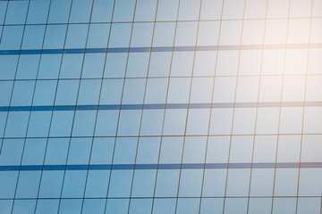 Blue glass windows of office building