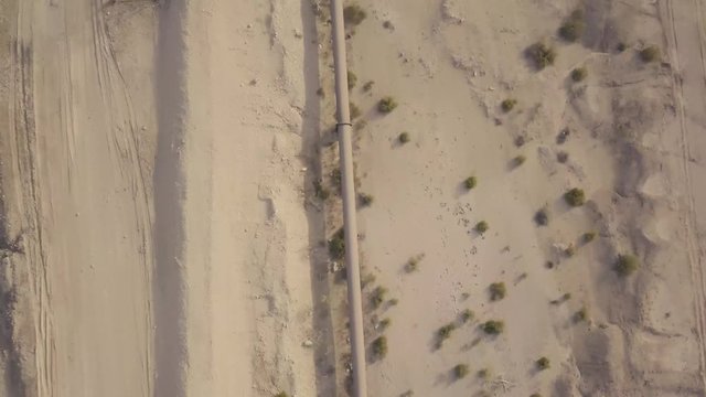 Long oil pipeline in the desert &ndash; birds eye view (4K)