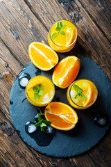 Fresh summer cocktail with orange and mint