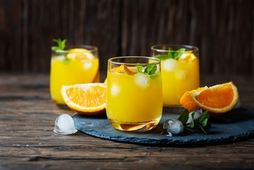 Fresh summer cocktail with orange and mint
