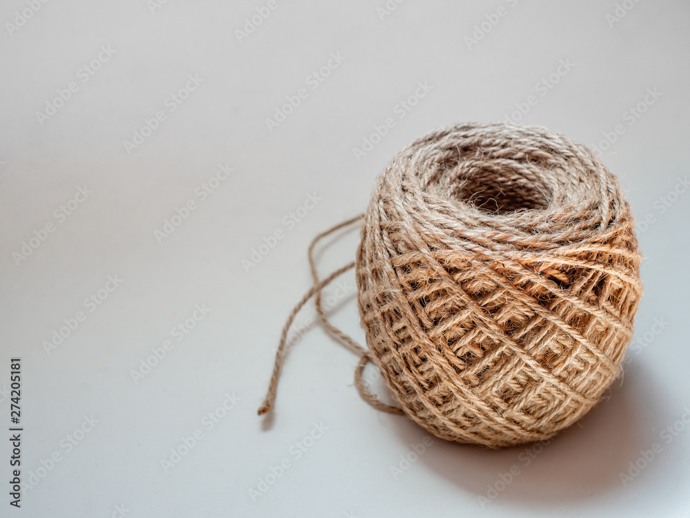 Wall mural skein of jute twine isolated on white background