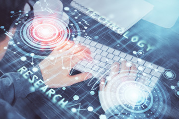 Double exposure of tech drawings with hands working on computer background. Concept of innovation.