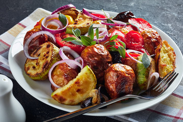 roasted hot vegetables on a white plate