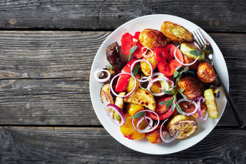 roasted hot vegetables on a white plate