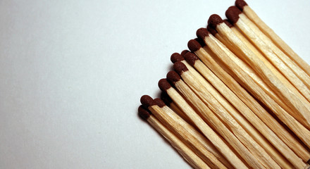Group of unburned matches isolated on white background.