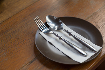 fork and spoon on plate