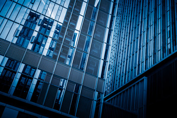 Urban abstract - windowed corner of office building.