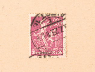 GERMANY - CIRCA 1950: A stamp printed in Germany shows working men, circa 1950