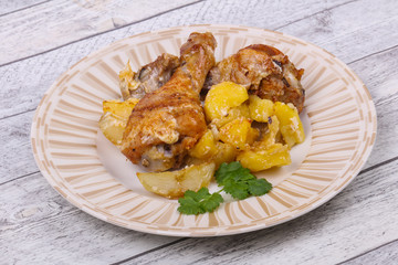 Roasted chicken legs with potato