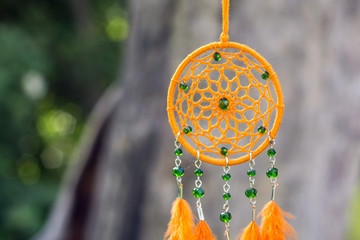 Handmade dream catcher with feathers threads and beads rope hanging