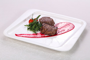 Beef steak with berry sauce