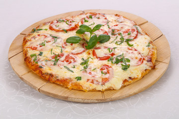 Pizza with tomato and cheese