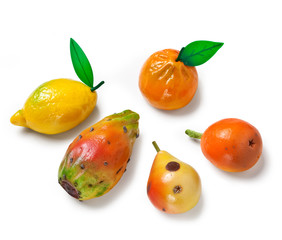 Marzipan fruits on a white background, frutta Martorana typical Sicily