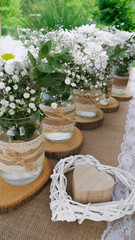 White daisy bouquets in glass jars and wooden heart box in wattle white heart 