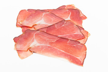 Hamon sliced on white background. Spanisch traditional meat.