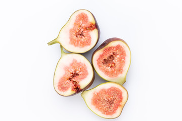 Fig fruits isolated on white background. Top view. Flat lay pattern