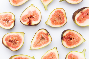 Fig fruits isolated on white background. Top view. Flat lay pattern
