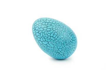 Toy Dinosaur egg for Easter isolate on white