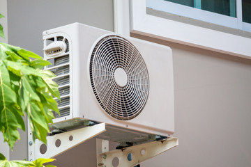 Air conditioner compressor outdoor unit installed outside the house