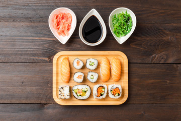 Japanese sushi with wasabi, ginger and algae salad