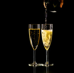 Bottle and glasses of Champagne toasting for New year Romantic Celebration and Special moments