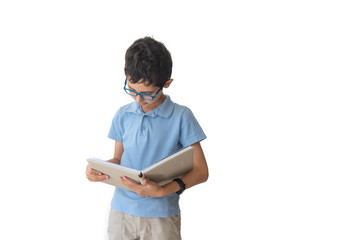 Boy in spectacles and polo looking to his book. Isolated over white background. Schoolboy. Teenager.